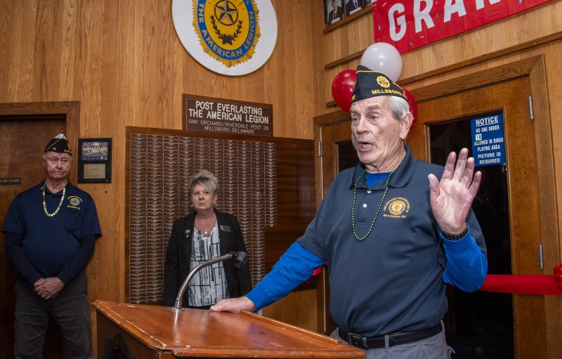 Post 28 Commander Joe Brown praises the efforts of Jim Beattie and Lisa Schumann.